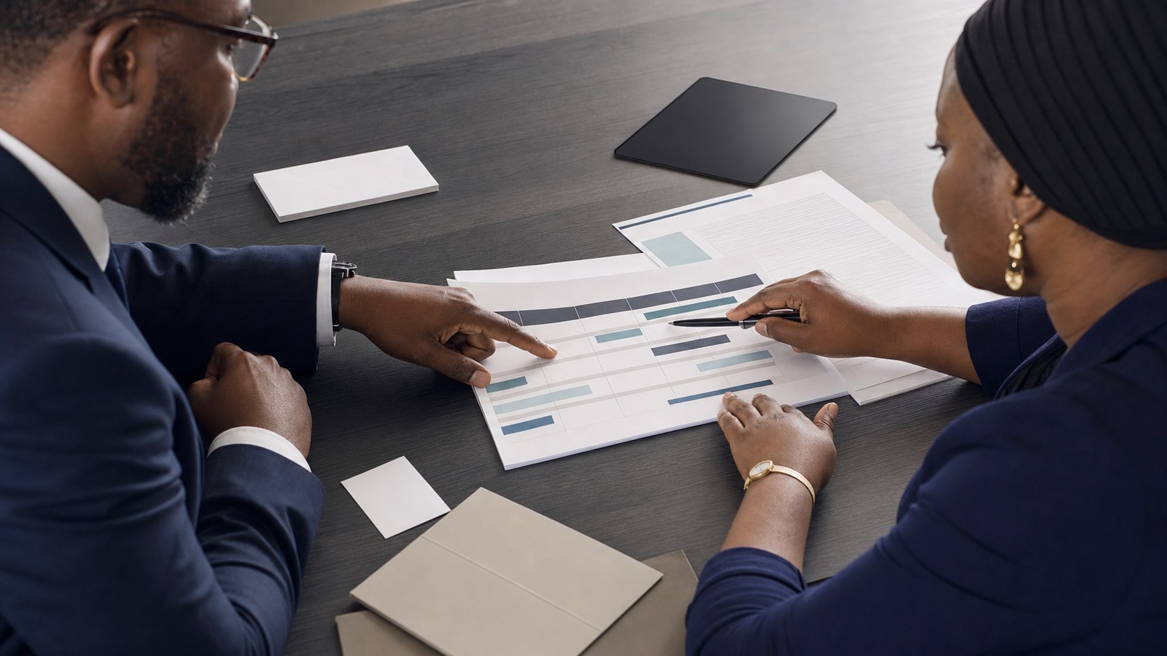Governance leads reviewing a clear responsibility and delivery matrix
